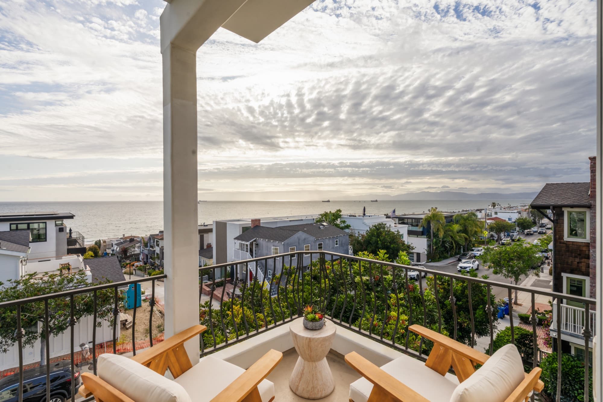Golden-hour view from the balcony of a SORĀ home